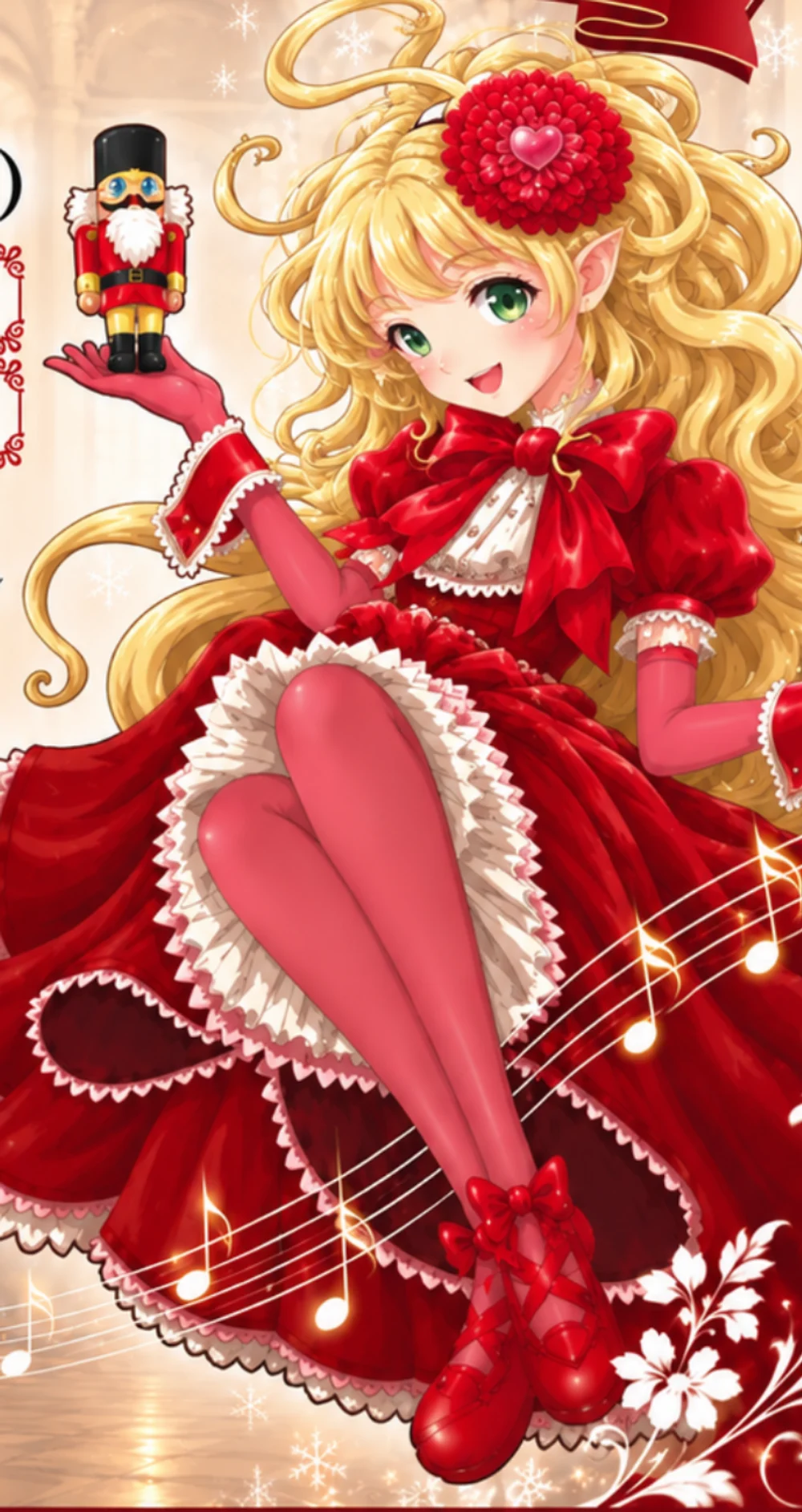 くるみ割り人形を手にのせた、赤いドレスのクララ